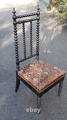 216/ Chaise de nourrice chauffeuse en bois tourné. XIXe Napoléon III