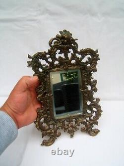 Ancien miroir bronze a poser fin XIX Napoleon III glace biseauté téte d enfant