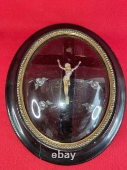 Ancien reliquaire Christ angelots verre bombé cadre Napoléon III XIXe