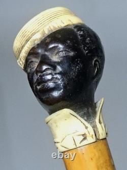 Ancienne badine canne de Dandy fin XIXe pommeau tête homme noir en ébène sculpté
