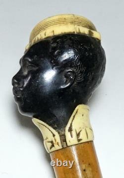 Ancienne badine canne de Dandy fin XIXe pommeau tête homme noir en ébène sculpté