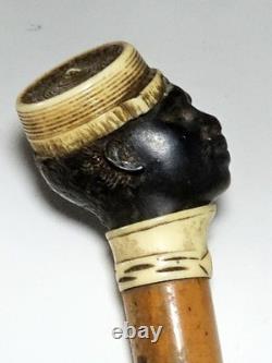 Ancienne badine canne de Dandy fin XIXe pommeau tête homme noir en ébène sculpté