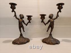 Ancienne paire de bougeoirs aux putti style Napoléon III XIXe siècle