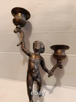 Ancienne paire de bougeoirs aux putti style Napoléon III XIXe siècle