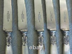 Coffret 24 couteaux manches nacre, lame acier, virole argent, XIX ème siècle