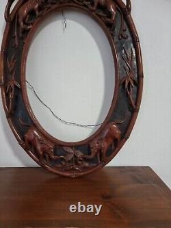 Encadrement miroir bois sculpté dans le gout de Viardot fin XIX / début XX e