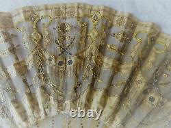 Éventail XIXe en corne, soie et mousseline avec motifs or