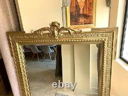 Grand Miroir Napoléon III en bois doré à décor de frises, XIXe