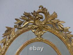 Grand Miroir Ovale à Parecloses d'époque Napoléon III En Bois Et Stuc Doré, XIX