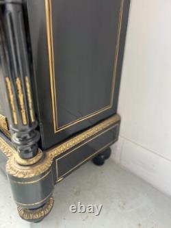 Meuble Napoléon III a une porte en bois noir et marquetrie de laiton XIX siècle