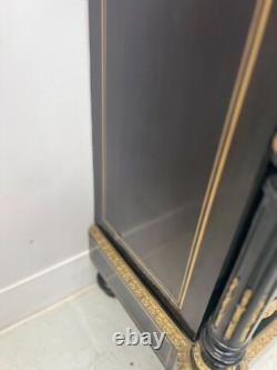 Meuble Napoléon III a une porte en bois noir et marquetrie de laiton XIX siècle