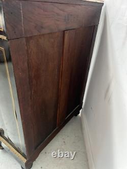Meuble Napoléon III a une porte en bois noir et marquetrie de laiton XIX siècle