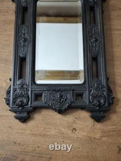 Miroir Napoléon III XIXe siècle bois noirci riche décor glace biseautée Miroir Napoléon III XIXe siècle bois noirci riche décor glace biseautée