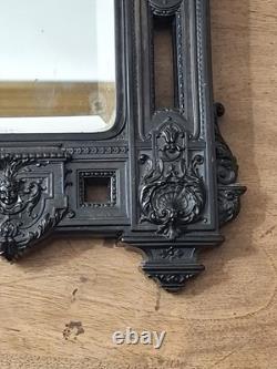 Miroir Napoléon III XIXe siècle bois noirci riche décor glace biseautée Miroir Napoléon III XIXe siècle bois noirci riche décor glace biseautée