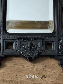 Miroir Napoléon III XIXe siècle bois noirci riche décor glace biseautée