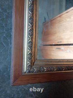 Miroir Napoléon III en bois et stucs dorés Fin du XIXe siècle 59 x 49 cm