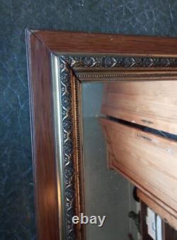 Miroir Napoléon III en bois et stucs dorés Fin du XIXe siècle 59 x 49 cm