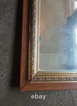 Miroir Napoléon III en bois et stucs dorés Fin du XIXe siècle 59 x 49 cm