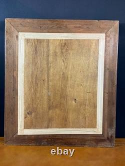 Miroir XIXe Napoléon III en bois noirci sur fond or