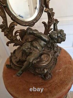 Miroir de table en régule orné d'un angelot fin XIX ème s