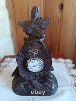 Montre en argent du XIX Napoléon III avec son porte montre en bois sculpté
