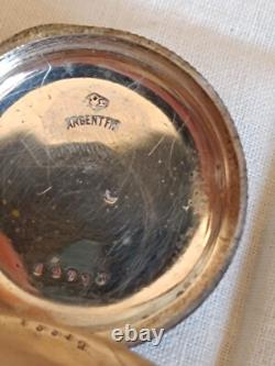 Montre en argent du XIX Napoléon III avec son porte montre en bois sculpté