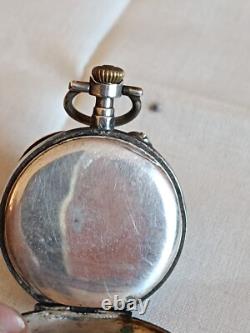 Montre en argent du XIX Napoléon III avec son porte montre en bois sculpté