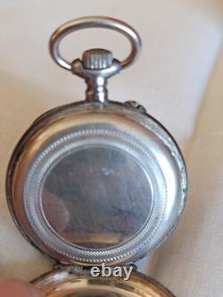 Montre en argent du XIX Napoléon III avec son porte montre en bois sculpté