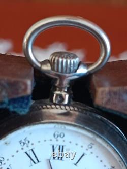 Montre en argent du XIX Napoléon III avec son porte montre en bois sculpté