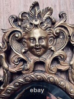 Paire d'appliques en bronze avec miroirs aux mascarons XIXE Napoleon III