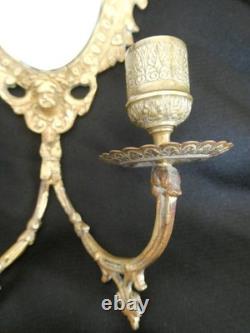Paire d'appliques en bronze doré deux bras de lumière fond de miroir XIXe siècle