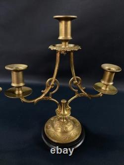 Paire de bouts de table bougeoirs en bronze sur socle onyx XIXe Napoléon III Paire de bouts de table bougeoirs en bronze sur socle onyx XIXe Napoléon III