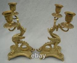 Paire de chandeliers en bronze griffons fin XIX