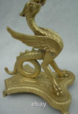 Paire de chandeliers en bronze griffons fin XIX