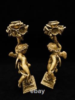 Paire de grands bougeoirs aux putti en bronze doré XIXe 33 cm 4 kg