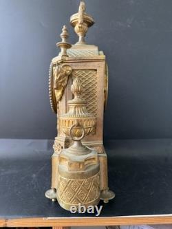 Pendule Empire bronze doré têtes de bélier France XIXe Napoléon III CheminClock