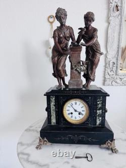 Pendule de cheminée Napoléon III en marbre noir et régule XIXe