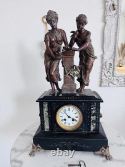 Pendule de cheminée Napoléon III en marbre noir et régule XIXe