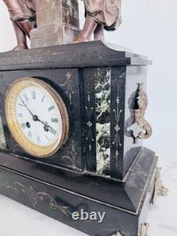 Pendule de cheminée Napoléon III en marbre noir et régule XIXe