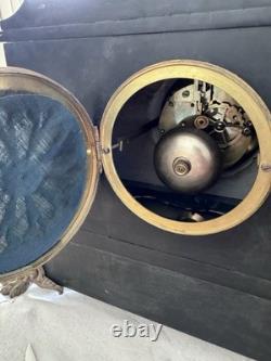 Pendule de cheminée Napoléon III en marbre noir et régule XIXe