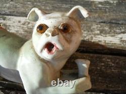 Rare sujet statuette chien avec son Os en céramique XIXe yeux en verre