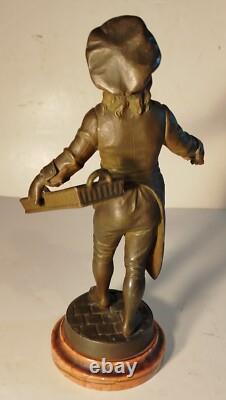 Statuette XIXe enfant vendeur de rue de pain