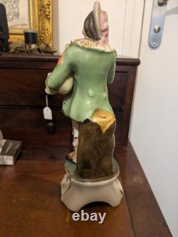 Statuette ancienne en porcelaine XIXe Joueur de musette / Porte-plume Vieux