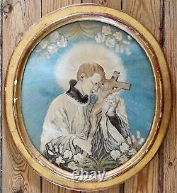 Tableau broderie religieuse XIXe portrait Saint-Louis Gonzague cadre bois doré