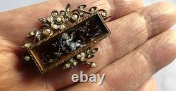 XIXè BROCHE VERMEIL ET EMAIL DEMI-PERLES. AMOUR JOUANT DE LA FLUTE. 393